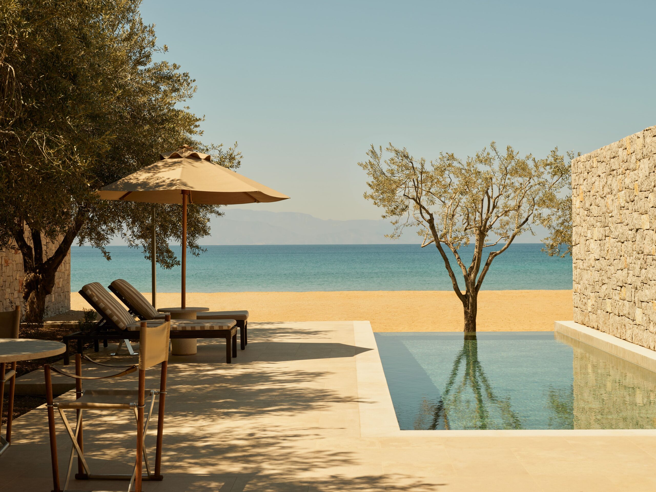 Amanzoe, Greece - Accommodation, Beach Pavilion, Pool, Exterior Local lavendel is used at the Spa at Maslina Resort<br />